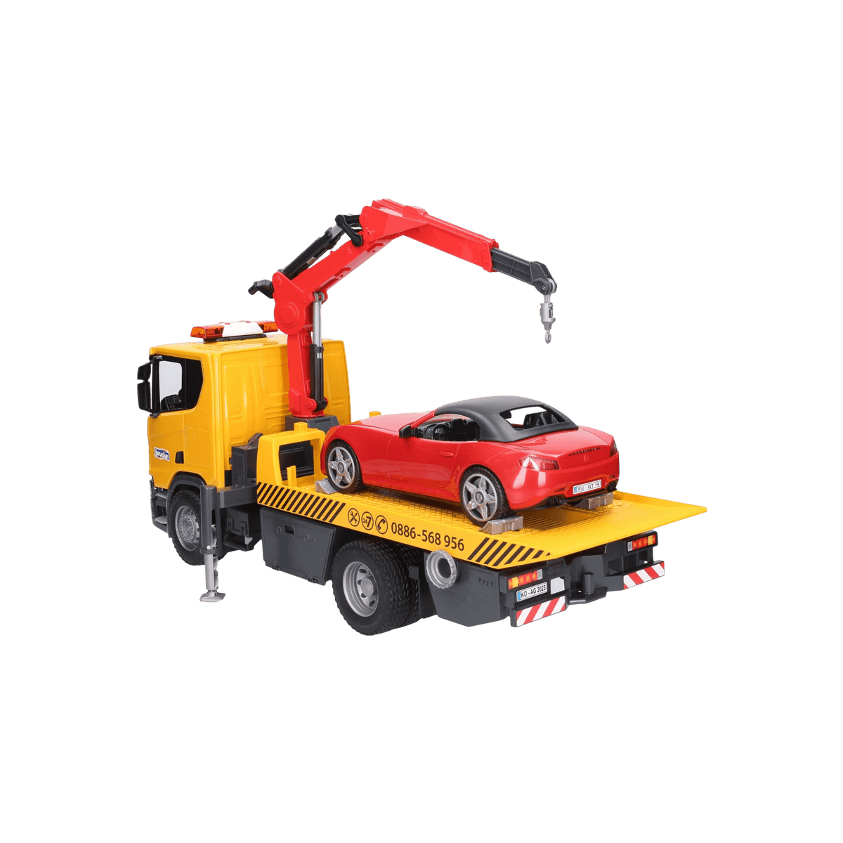 Laweta pomocy drogowej z autem wyścigowym BRUDER Scania Super 560R.