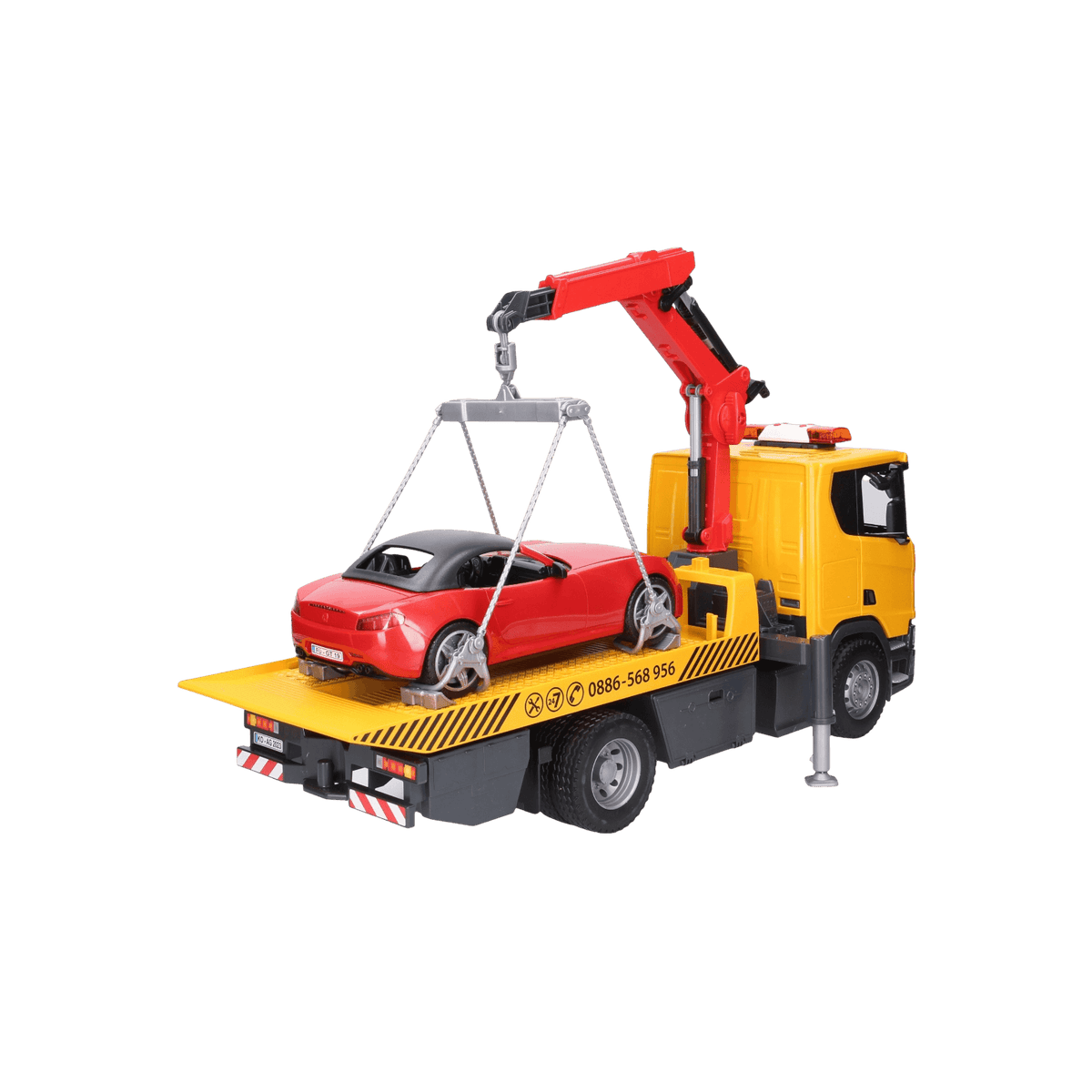 Laweta pomocy drogowej z autem wyścigowym BRUDER Scania Super 560R.