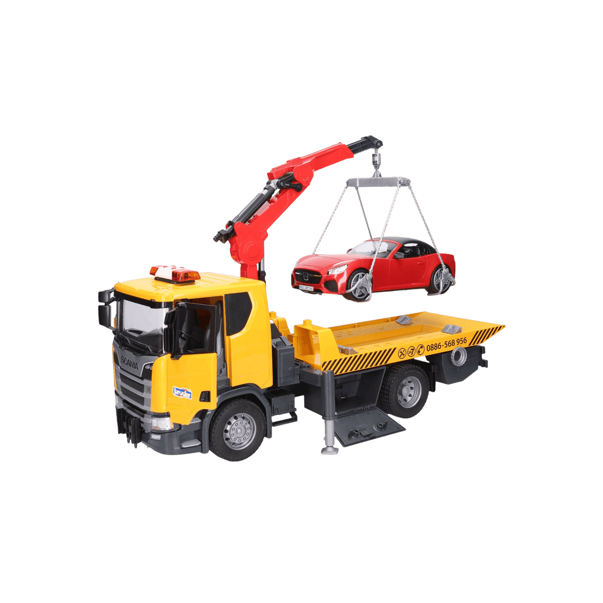 Laweta pomocy drogowej z autem wyścigowym BRUDER Scania Super 560R.