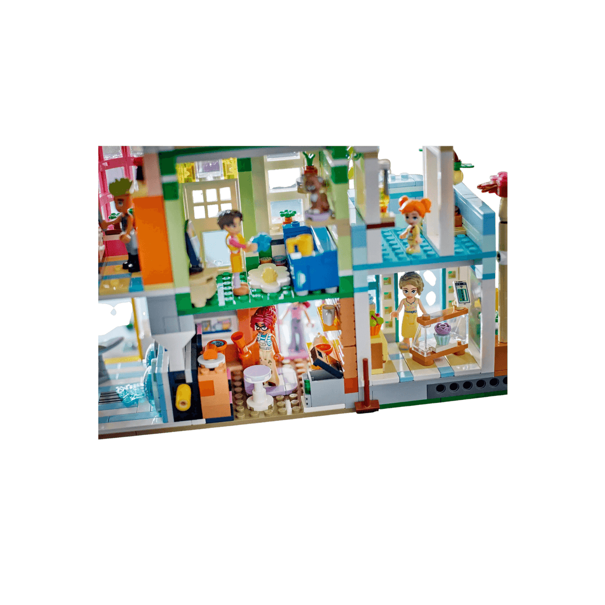 LEGO Friends Zestaw Mieszkania i sklepy w mieście Heartlake 42670.