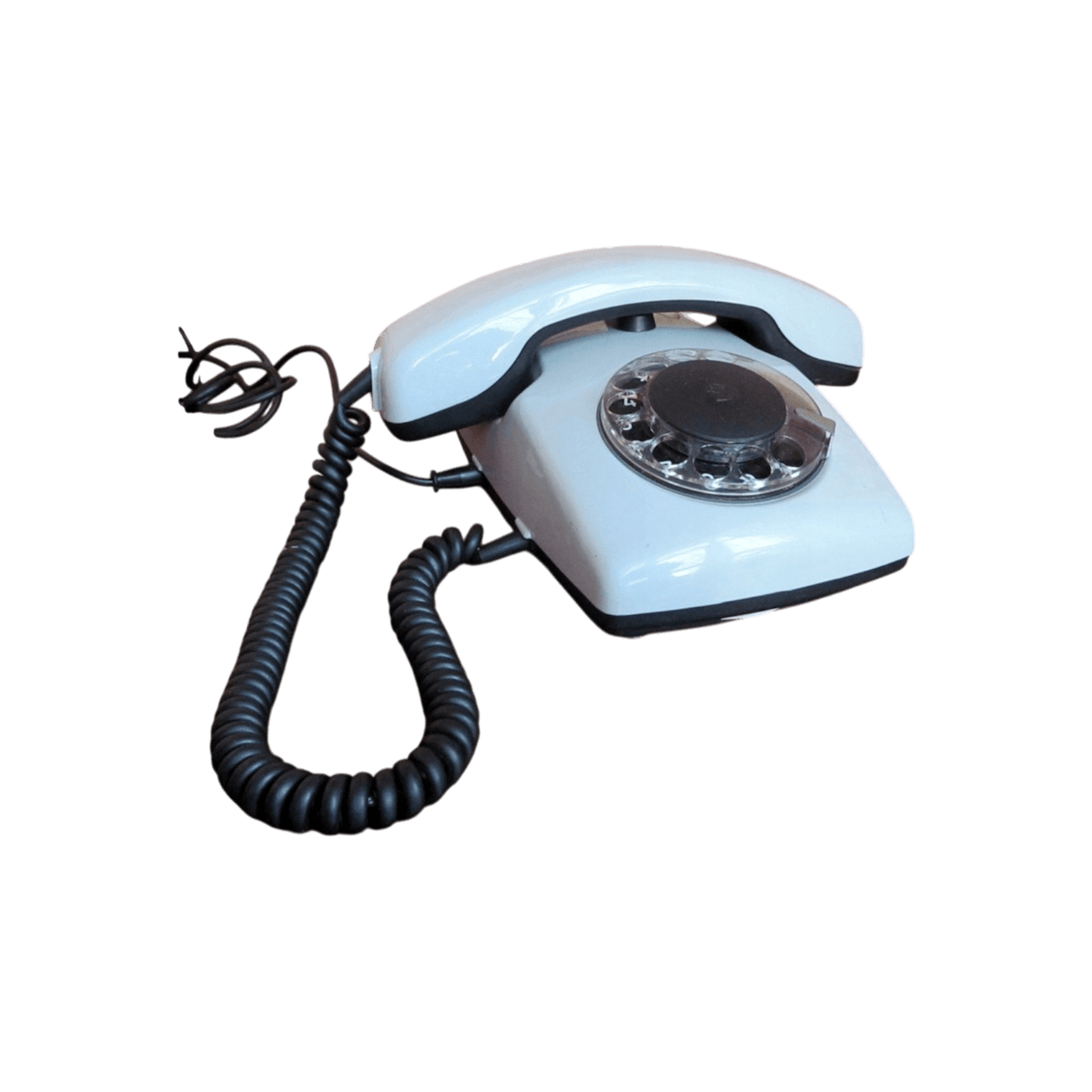 Telefon stacjonarny z obrotową tarczą.