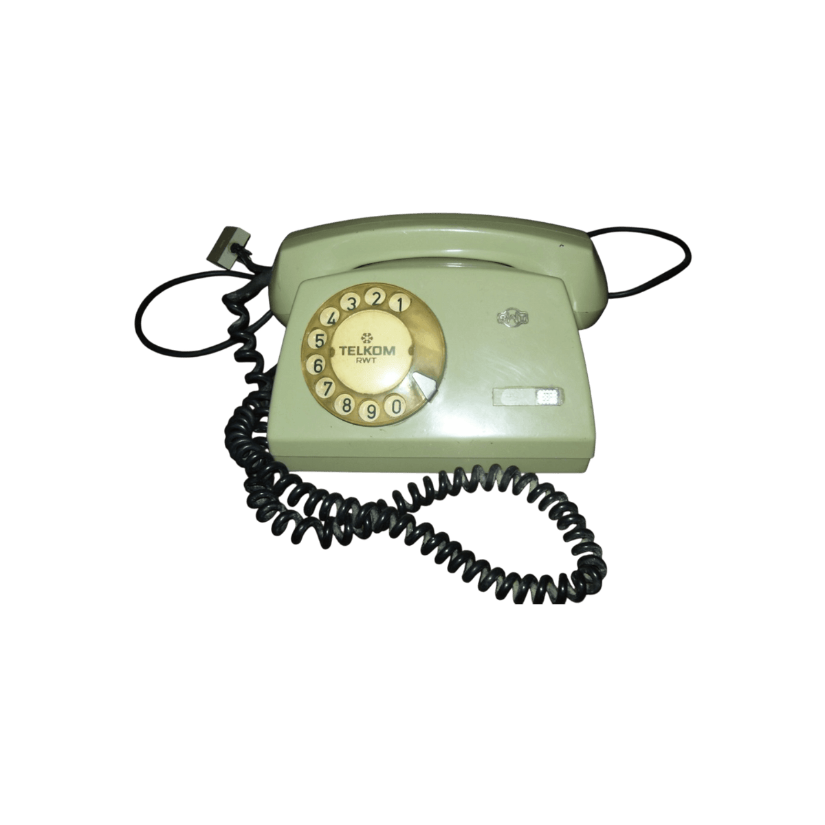 Telefon stacjonarny z obrotową tarczą.